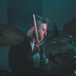 Dustin Kaufman plays the drums.