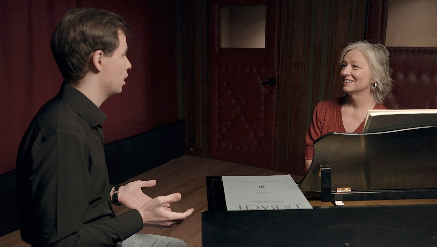 Eduard discussing the music schools admission process