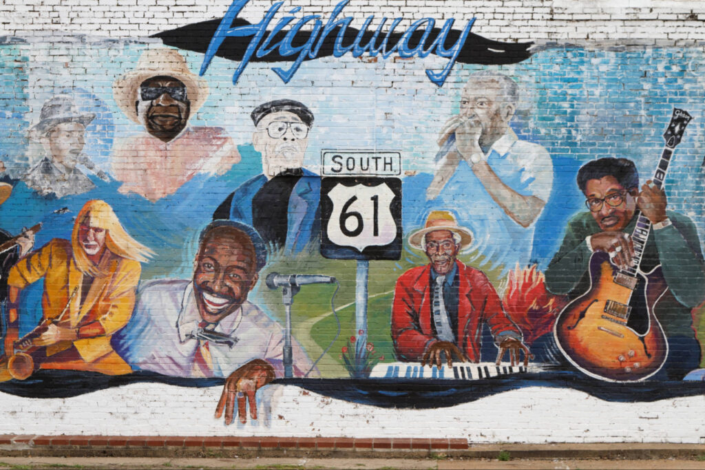 Best colleges in the south - mural of famous musicians in the southern US